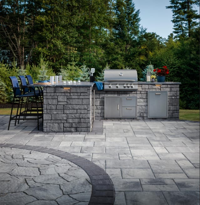Paver patio with fire pit area for hardscape landscaping in Utah